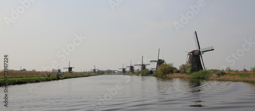 Dutch landscape with windmills.