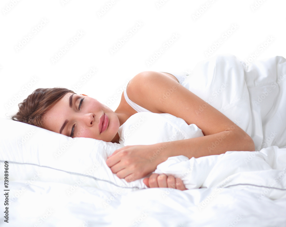 Beautiful girl sleeps in the bedroom, lying on bed Beautiful girl sleeps in the bedroom, lying on bed