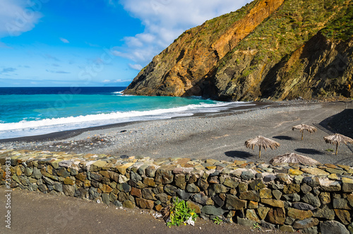 Volcanic black sand beach in Vallehermoso, La Gomera island photo