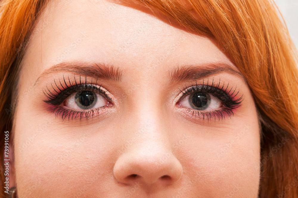 Young redhead girl with falsed eyelash Young redhead girl with falsed eyelash