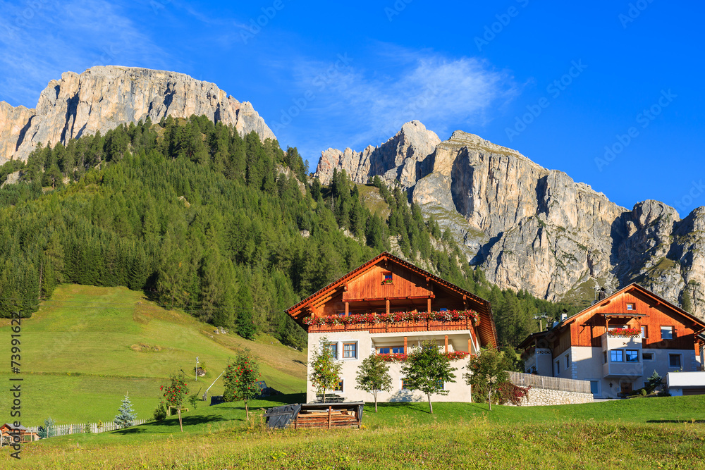 Houses in Colfosco alpine village, Dolomites Mountains, Italy