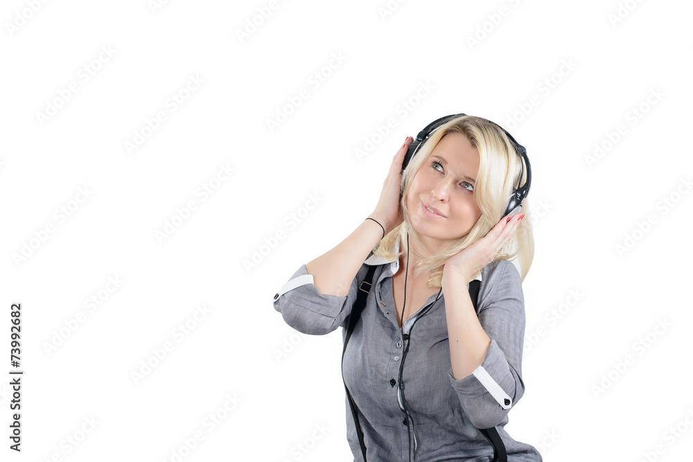 Young lady in a headset enjoying music Young lady in a headset enjoying music