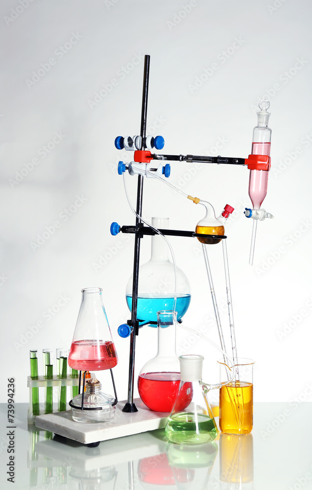 Laboratory glassware on light background Laboratory glassware on light background