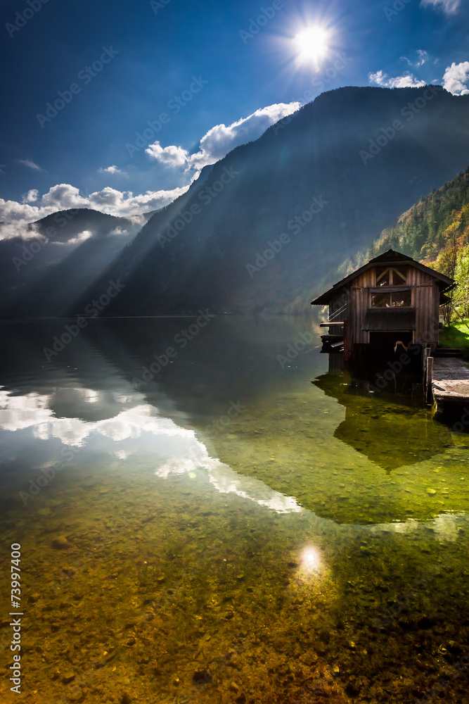 Fototapeta premium Old wooden haven at mountain lake