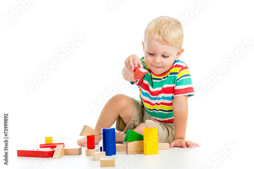kid boy playing  wooden toys