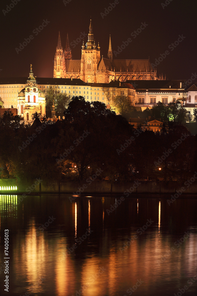 Night Prague gothic Castle above River Vltava, Czech Republic