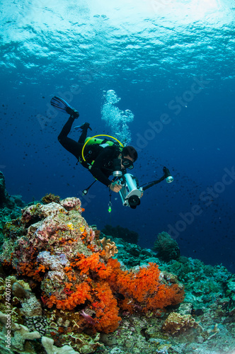 Diver swimming in Banda  Indonesia underwater photo