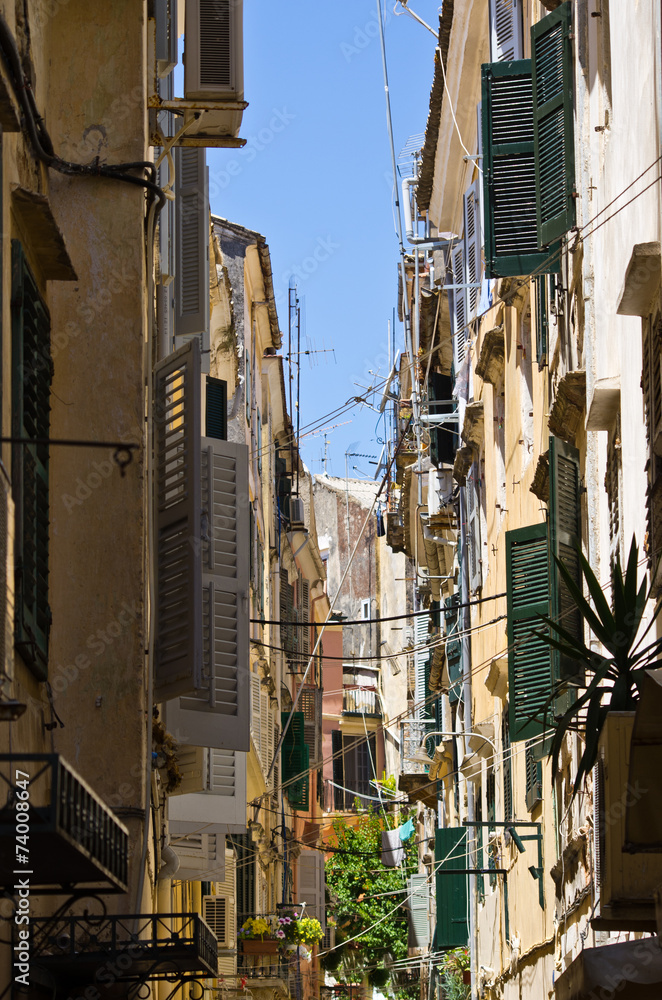 Narrow street in mediterranean town - Corfu, Greece