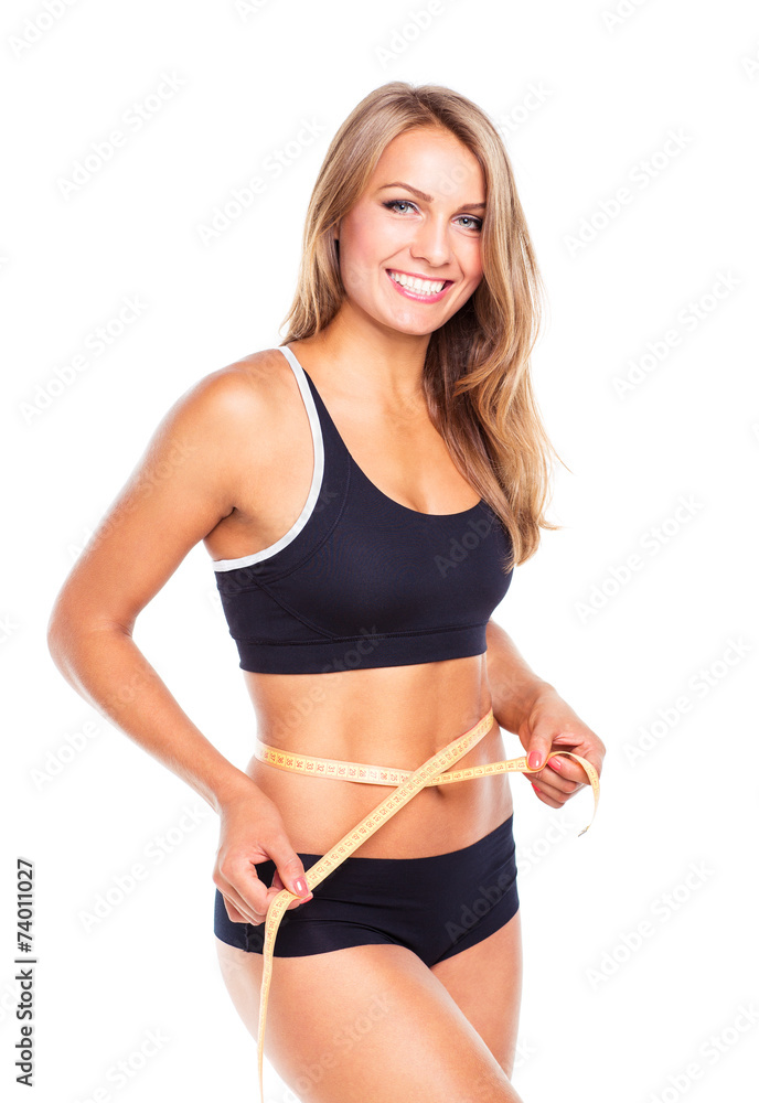 Woman measuring perfect shape of beautiful thigh, healthy lifest Woman measuring perfect shape of beautiful thigh, healthy lifest