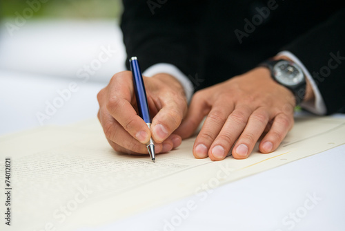 signatures during a wedding ceremony