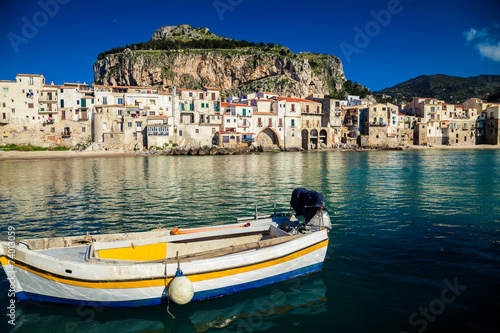 old boat drifting in a Cefalu harbor