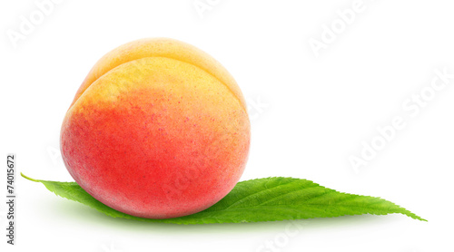 Isolated peach. Single peach with leaf over white background, with clipping path