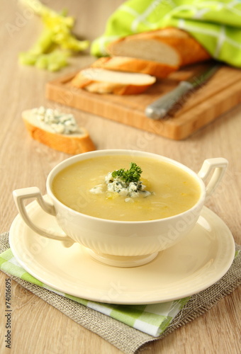 Homemade onion soup with celery and blue cheese