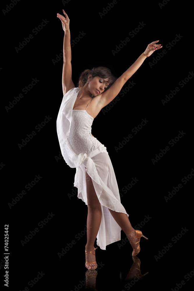 Obraz premium elegant beautiful woman latin dancer performing on black backgro