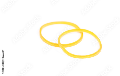 Yellow rubber ring isolated on white background