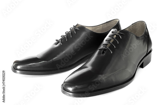 Black shiny leather shoe isolated.