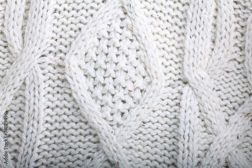 texture of white wool knit sweater homemade