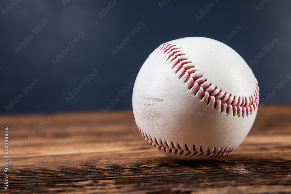 Baseball ball on wooden table
