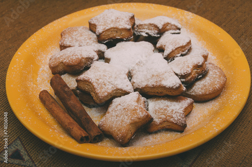 homemade gingerbread on a yellow plate photo