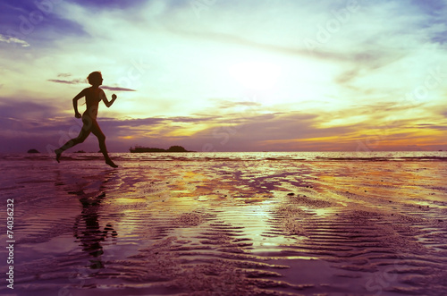 goal, silhouette of barefoot woman running on the beach