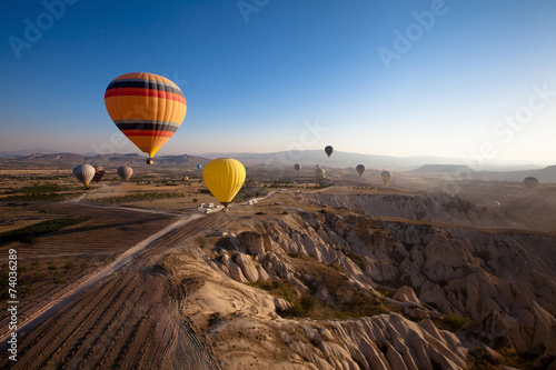 inspiring beautiful landscape with hot air balloons photo