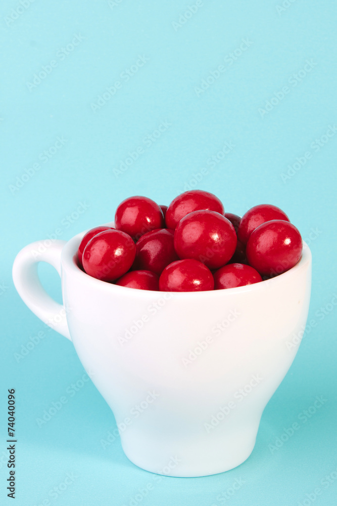 red candy chocolate ball in a cup red candy chocolate ball in a cup