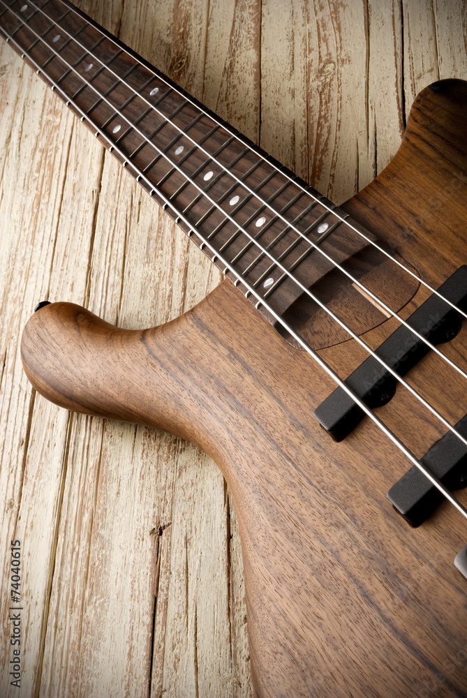 Fototapeta premium bass guitar on aged wood
