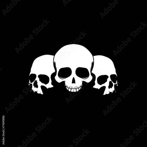 Three sculls on black background