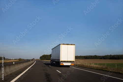 White truck on an open road