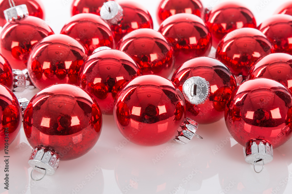 Red Christmas balls isolated at a white background