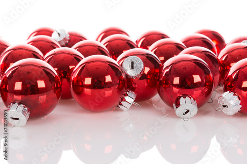 Red Christmas balls isolated at a white background