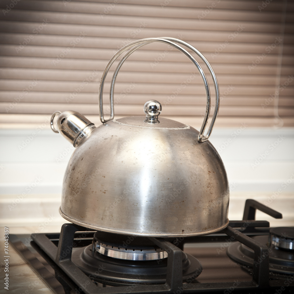 Whistling kettle on the stove Whistling kettle on the stove