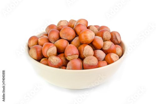 Hazelnuts in an old ceramic dish