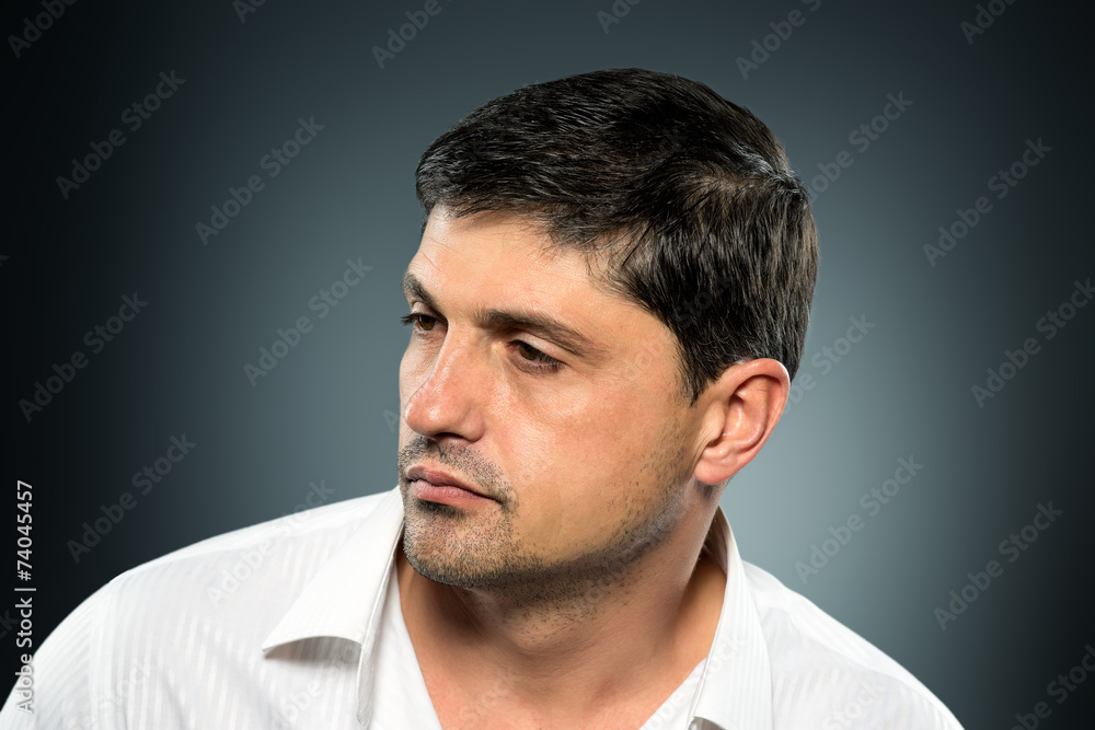 Portrait of young man with very handsome face in white casual s Portrait of young man with very handsome face in white casual s