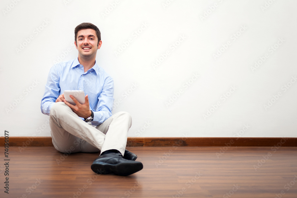 Man using a digital tablet Man using a digital tablet