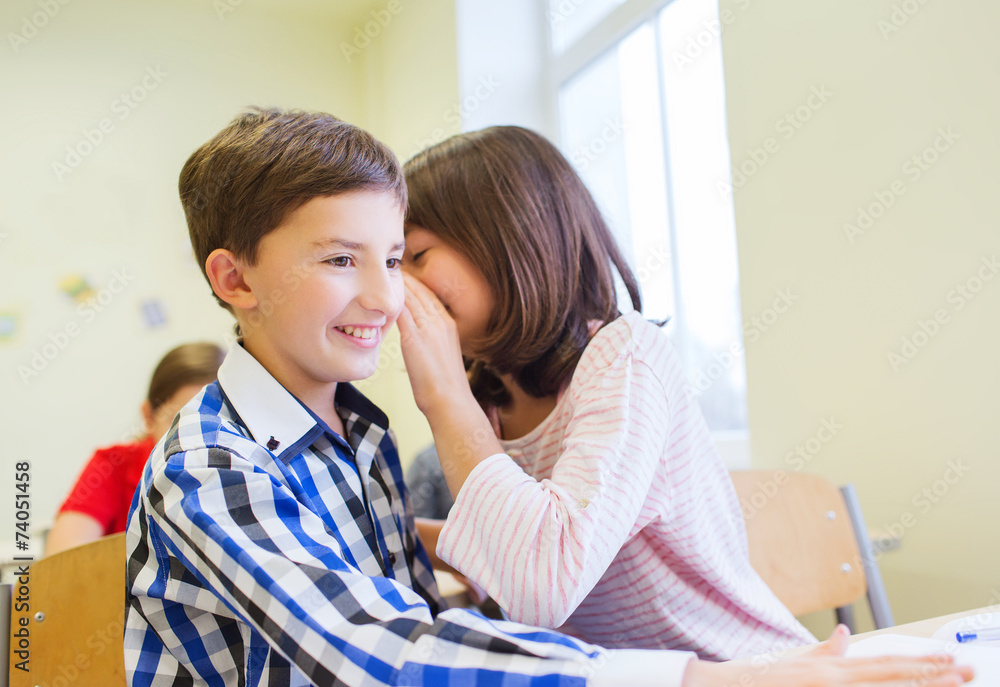 smiling schoolgirl whispering to classmate ear smiling schoolgirl whispering to classmate ear