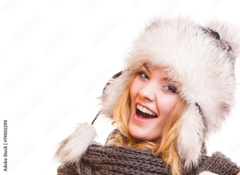 Winter fashion girl in fur hat doing fun isolated Winter fashion girl in fur hat doing fun isolated