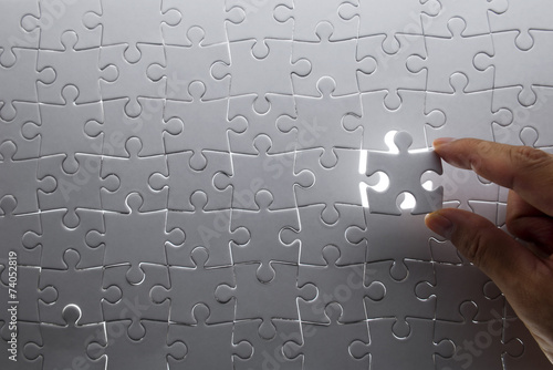 Canvas Print puzzle piece coming down into it's place