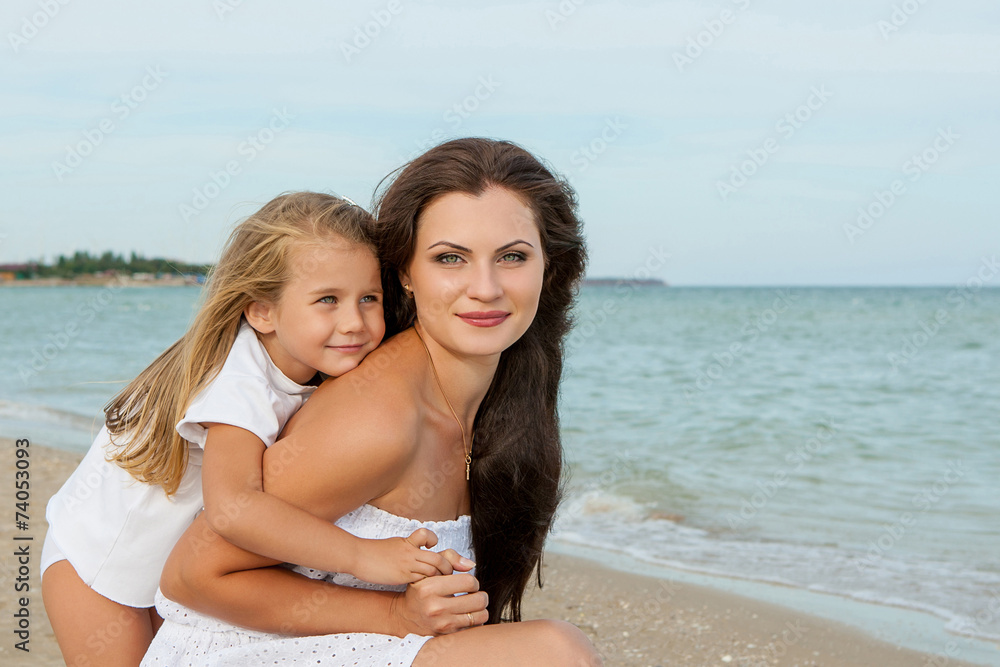 Mother and her little daughter hugging. Mother and her little daughter hugging.