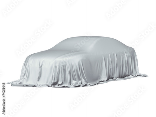 Foto Car covered with a grey cloth
