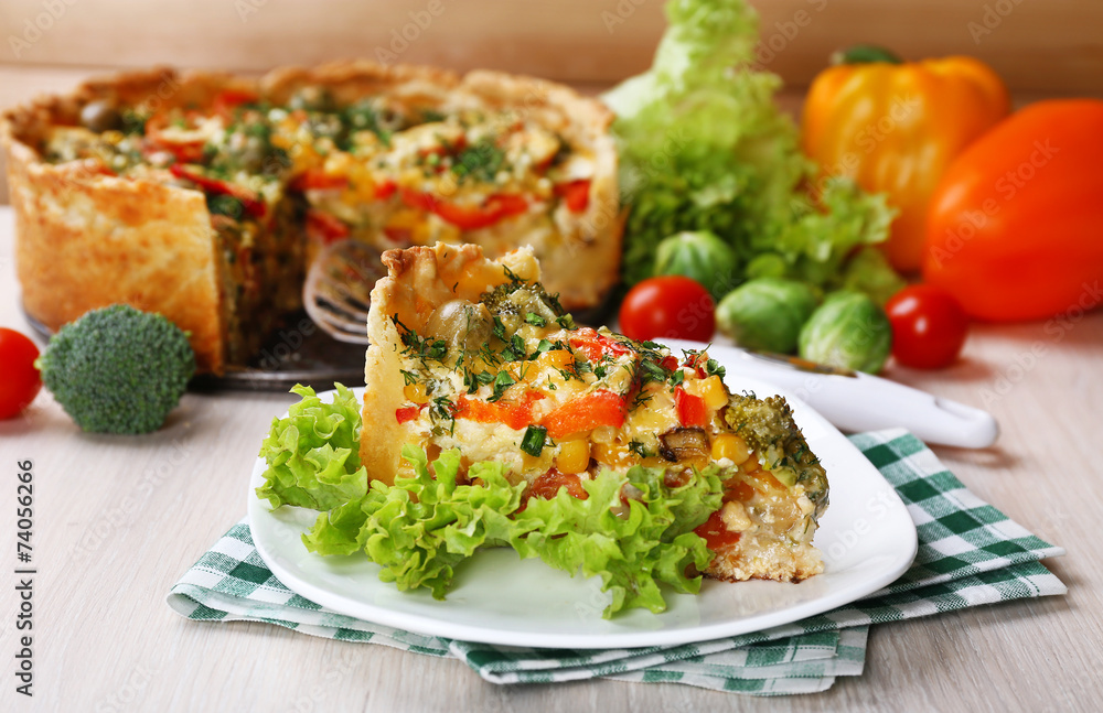 Piece of Vegetable pie with broccoli, peas, tomatoes and cheese Piece of Vegetable pie with broccoli, peas, tomatoes and cheese