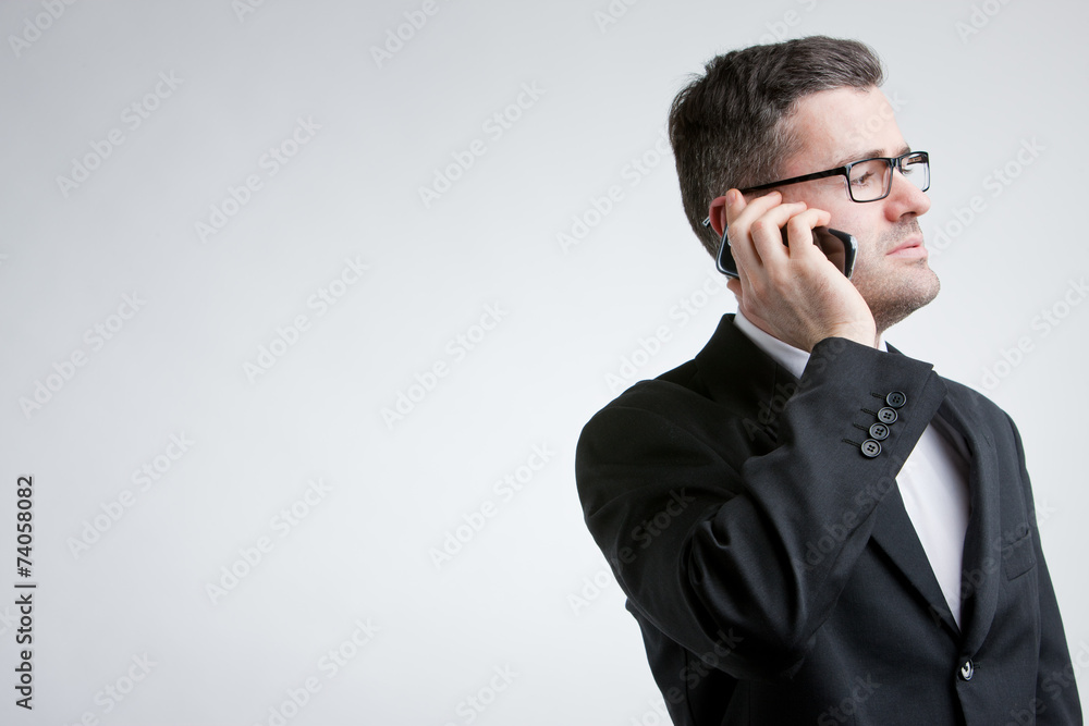 business man phoning with a mobile business man phoning with a mobile