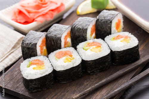 Sushi rolls with salmon and vegetables
