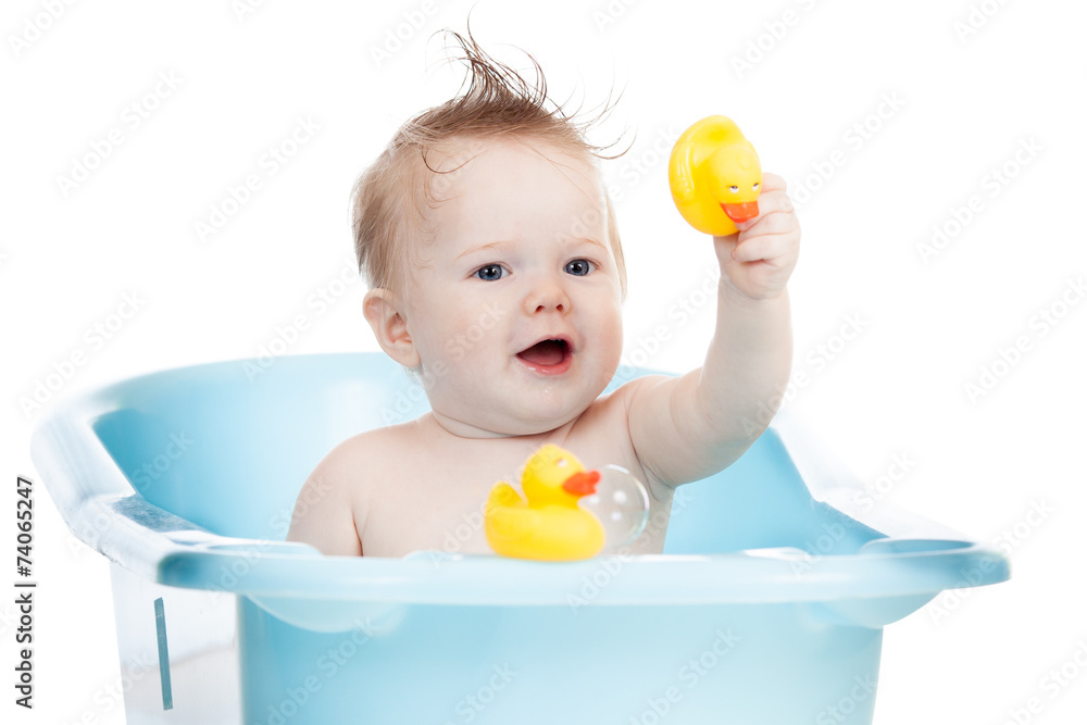 adorable child taking bath in blue tub adorable child taking bath in blue tub