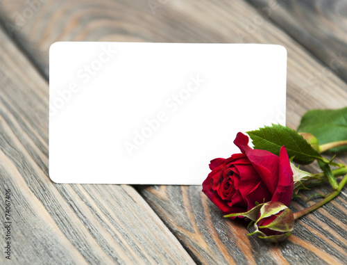 Fototapeta Naklejka Na Ścianę i Meble -  Red rose and greeting card