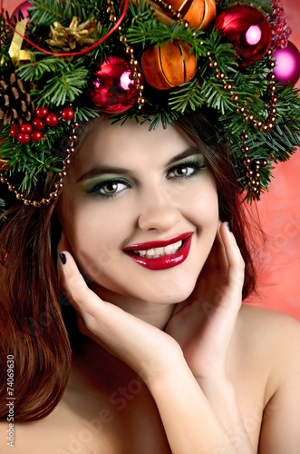 Christmas Woman. New Year and Christmas Hairstyle and Make up