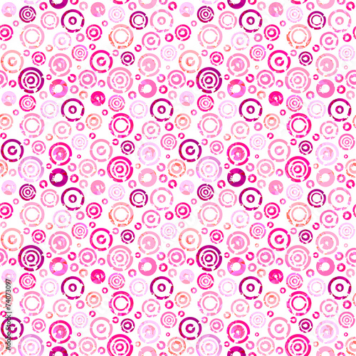 Seamless pattern with pink circles on wight background.