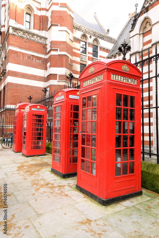 Row of public red telephone boxes in London Row of public red telephone boxes in London