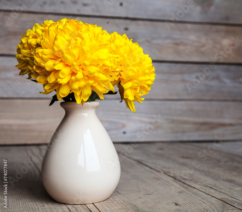 Flowers. Beautiful yellow chrysanthemum in a vase