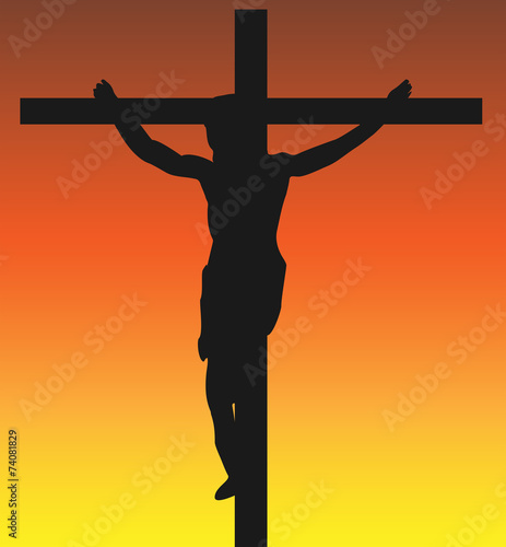 Jesus on the Crucifix with a Sunset Background